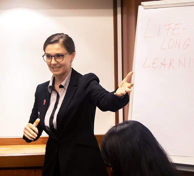 A SOLS edu teacher leading a class